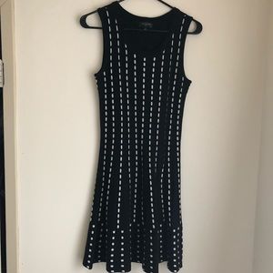 Sleeveless black and white knit sweater dress